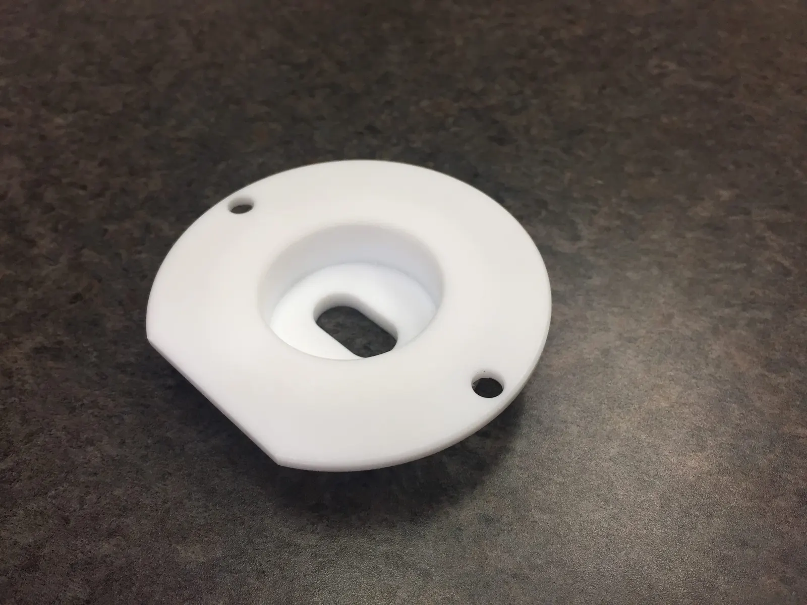 White polymer flange with slotted bore